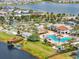 Beautiful community featuring a resort-style pool, clubhouse, lake access, and well-maintained landscaping at 4704 Sleepy Hollow Dr, Kissimmee, FL 34746