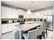 Modern kitchen with granite countertops, an island, and stainless steel appliances at 4704 Sleepy Hollow Dr, Kissimmee, FL 34746