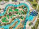 Aerial view showcasing a lazy river and putting range, perfect for relaxation and leisure at 4704 Sleepy Hollow Dr, Kissimmee, FL 34746
