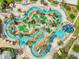 Aerial view showcasing a lazy river and putting range, perfect for relaxation and leisure at 4704 Sleepy Hollow Dr, Kissimmee, FL 34746