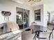 Enjoy outdoor living with a built-in grill and dining area on the screened patio at 4704 Sleepy Hollow Dr, Kissimmee, FL 34746