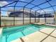 Beautiful private pool and jacuzzi with screened enclosure for year-round enjoyment at 4704 Sleepy Hollow Dr, Kissimmee, FL 34746