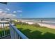 Enjoy serene ocean views from this property with manicured lawns, clear skies, and the sound of waves at 5201 S Atlantic Ave # 405A, New Smyrna Beach, FL 32169