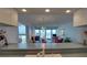 Kitchen view to the living room and ocean view at 5201 S Atlantic Ave # 405A, New Smyrna Beach, FL 32169