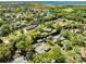 Neighborhood aerial view with waterfront homes, canals, lakes and easy access to the open water at 5370 Whispering Pine Cir, St Cloud, FL 34771