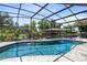 Beautiful pool with a screened-in enclosure and gazebo in a well-maintained backyard at 5370 Whispering Pine Cir, St Cloud, FL 34771