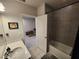 Bathroom with a combination tub and shower, and a vanity with a white countertop at 5526 Bonn Way, St Cloud, FL 34771
