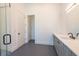 Bathroom featuring a floating vanity, walk-in shower and modern fixtures at 6106 Marleon Dr, Windermere, FL 34786