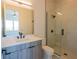 Modern bathroom featuring a glass shower, sleek vanity, and contemporary fixtures at 6106 Marleon Dr, Windermere, FL 34786