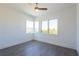 Bright bedroom with a ceiling fan and large windows offering natural light at 6106 Marleon Dr, Windermere, FL 34786