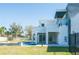 Contemporary home featuring a private pool and outdoor living space at 6106 Marleon Dr, Windermere, FL 34786