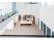 Aerial view of an open-concept living space into a modern kitchen with a large island at 6106 Marleon Dr, Windermere, FL 34786