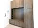 Mudroom featuring custom built-ins, bench seating, and storage cabinets at 6106 Marleon Dr, Windermere, FL 34786