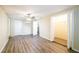 Spacious bedroom features modern ceiling fan, vinyl flooring, and large walk-in closet at 616 Conroy St, Orlando, FL 32805