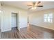 Open living room with laminate floors and ample closet space at 616 Conroy St, Orlando, FL 32805