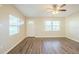 Bright living room with fresh paint, laminate floors and abundant natural light at 616 Conroy St, Orlando, FL 32805