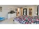Large bedroom with a large closet, dresser, and tv with abundant natural light at 6799 Helmsley Cir, Windermere, FL 34786