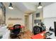 Well-lit office space with hardwood floors and stylish decor, ideal for remote work at 6799 Helmsley Cir, Windermere, FL 34786