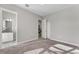 A bathroom featuring granite countertops, double sinks, and a stand-up shower at 7131 Desert Mandarin St, Winter Garden, FL 34787