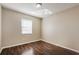 Bedroom featuring wood-look flooring and natural light at 7355 Rush Ct, Orlando, FL 32818