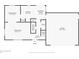 Layout of the first floor featuring a living room, kitchen, and garage space at 7355 Rush Ct, Orlando, FL 32818