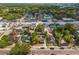 A high angle aerial of the tree lined city street and commercial district at 833 N Thornton Ave, Orlando, FL 32803
