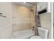 Cozy bathroom with tub and shower combo and vanity with storage at 833 N Thornton Ave, Orlando, FL 32803