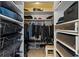 Walk-in closet featuring custom shelving and storage solutions to maximize space at 833 N Thornton Ave, Orlando, FL 32803