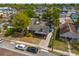 Aerial view of home showcasing the yard, neighborhood, and proximity to local businesses at 833 N Thornton Ave, Orlando, FL 32803