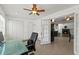 Bright room with white walls, tile flooring, and white trim, which could be used as an office at 833 N Thornton Ave, Orlando, FL 32803