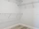 This walk-in closet has wire racks for optimal storage solutions at 869 Taramundi Dr, Oviedo, FL 32765