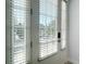 Elegant French doors with white blinds offer privacy and natural light at 869 Taramundi Dr, Oviedo, FL 32765