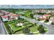 Aerial view of the neighborhood showcasing well-maintained homes, landscaping, and community features at 8872 Bismarck Palm Dr, Winter Garden, FL 34787