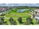 Sprawling green park area with pathways and lush landscaping in the heart of the residential community at 8872 Bismarck Palm Dr, Winter Garden, FL 34787