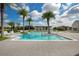 Beautiful pool area features resort-style seating and clear blue water at 8872 Bismarck Palm Dr, Winter Garden, FL 34787