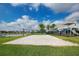 Community sand volleyball court perfect for fun outdoor recreation and exercise at 8872 Bismarck Palm Dr, Winter Garden, FL 34787