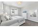 Bedroom featuring neutral walls, plush carpet and large windows at 14645 Scott Key Dr, Winter Garden, FL 34787