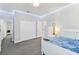 Well-lit bedroom featuring a closet and a view into the ensuite bath at 14645 Scott Key Dr, Winter Garden, FL 34787