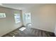 Bedroom with carpeted floors featuring natural light from multiple windows at 16161 Barkly Ridge Ct, Winter Garden, FL 34787