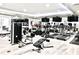 Well-equipped gym with treadmills, elliptical machines, and weight training equipment at 16300 County Road 455 # 513, Montverde, FL 34756