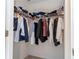 Organized walk-in closet with shelves, hanging rods and plenty of storage space at 17101 Water Spring Blvd, Winter Garden, FL 34787