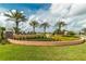 Lush landscaping and a welcoming sign mark the entrance to the Solara Resort community at 1720 Sawyer Palm Pl, Kissimmee, FL 34747