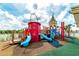 Vibrant community playground with slides, climbing structures, and soft play surfaces at 1720 Sawyer Palm Pl, Kissimmee, FL 34747