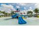 Fun splash pad featuring slides, water features, and palm trees, creating an exciting place for  at 1720 Sawyer Palm Pl, Kissimmee, FL 34747