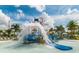 Fun splash pad area with water features, slides, and plenty of space for to play at 1720 Sawyer Palm Pl, Kissimmee, FL 34747