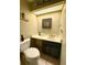 Small bathroom with a toilet and a sink at 1886 Saint Andrews Pl # 1886, Longwood, FL 32779