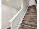 Beautiful staircase features modern wood steps and white railing at 2087 Crystal Bell St, Orlando, FL 32824