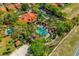 Aerial view of community pool, lush landscaping and luxurious outdoor amenities at 217 Sevilla Ave, Davenport, FL 33897