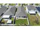 Aerial view of the property highlighting its backyard, privacy fence, and neighborhood setting at 2285 Canyon Breeze Ave, Kissimmee, FL 34746