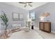 Serene Bedroom featuring soft colors, a cozy rocking chair, and a cute decorative elephant at 2413 Park Ridge St, Apopka, FL 32712